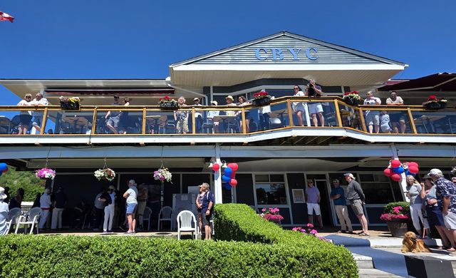 The clubhouse decorated with flags and balloons